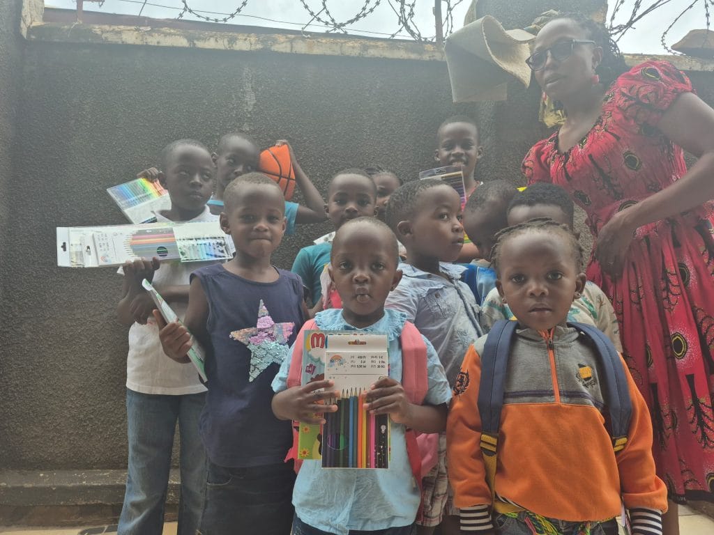 Travel with Purpose in Uganda: Thoughtful moments of giving, such as educational support,  can create meaningful connections between travelers and local communities.
