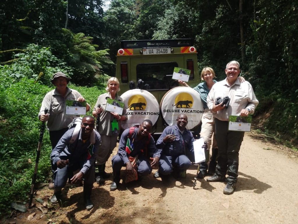 Safari guests in Uganda during a meaningful travel experience combining wildlife, community connection, and purpose-led safari travel