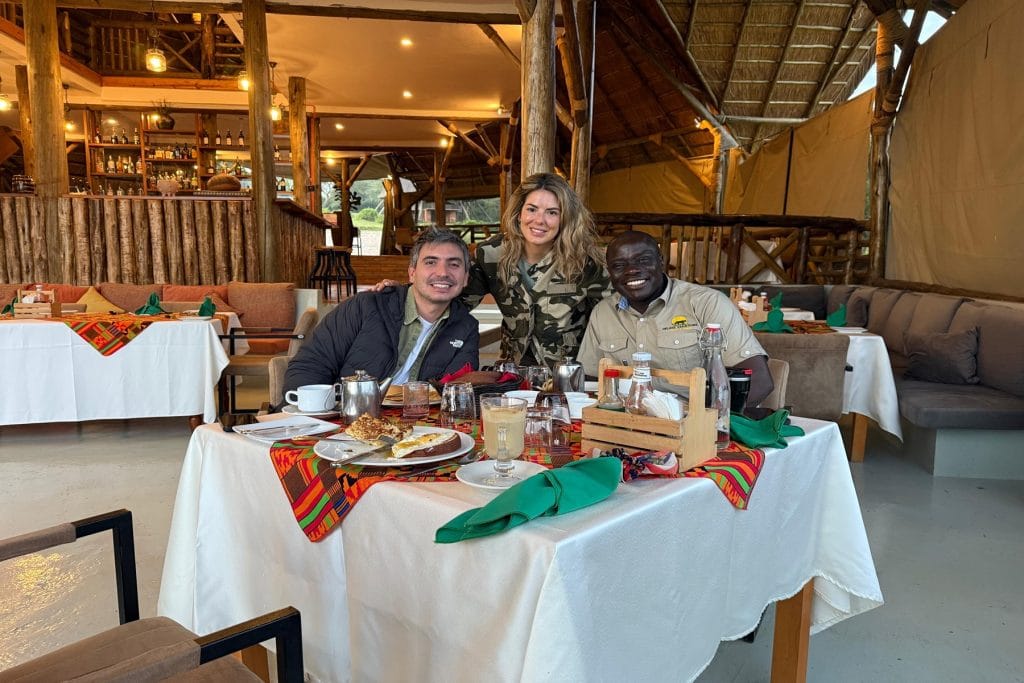 Couple enjoying a luxury Uganda honeymoon safari experience at a safari lodge