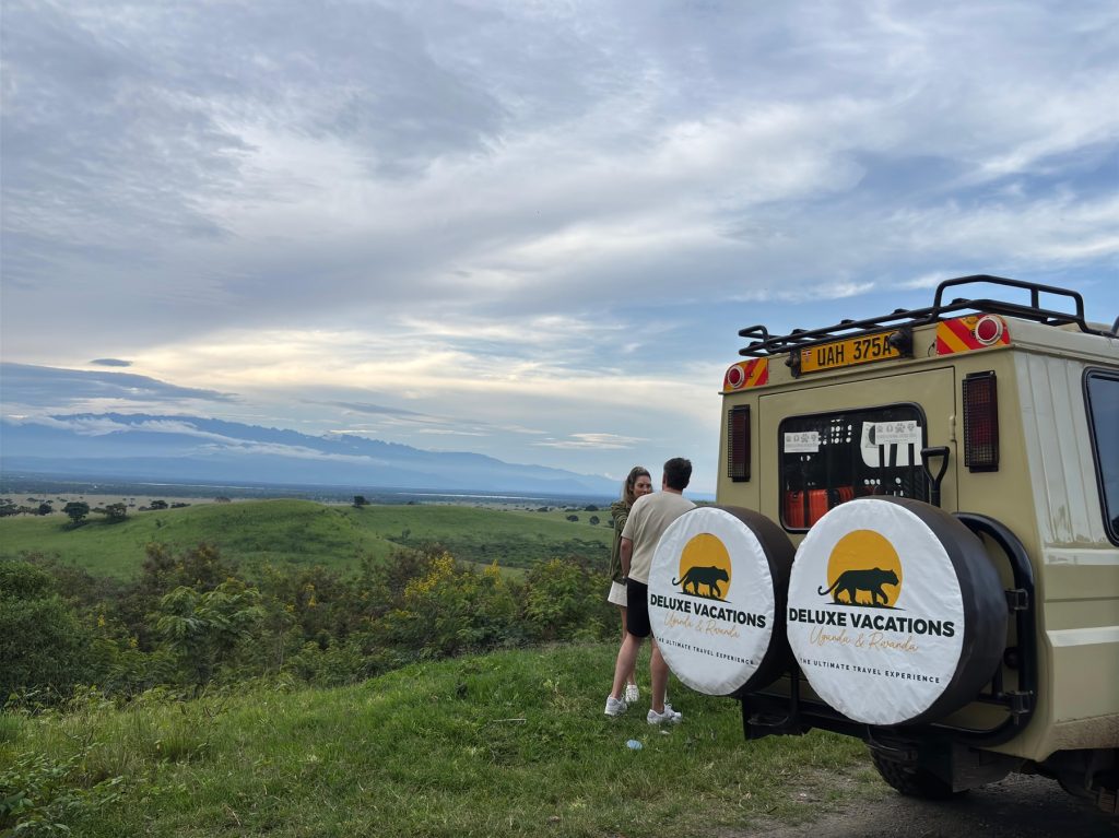 Couple enjoying scenic views during a luxury Uganda honeymoon safari